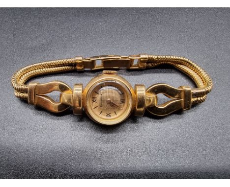 A 1950s Boucheron ladies manual wind bracelet watch,&nbsp;17.5mm, stamped French control marks for 18ct gold, serial No. 1063