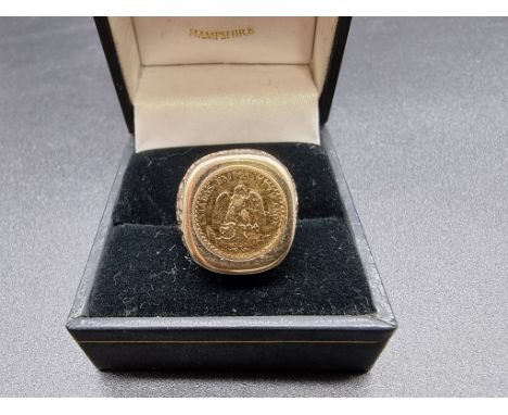 A 9ct gold ring inset Mexican gold coin, size O 1/2, gross weight 8.7g. 