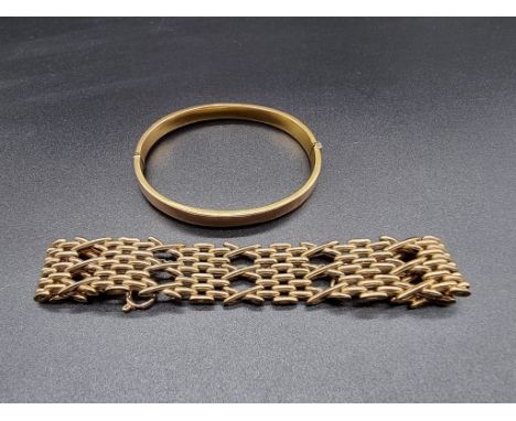 A 9ct gold hinged bangle; together with a 9ct gold gate bracelet, 32g. 