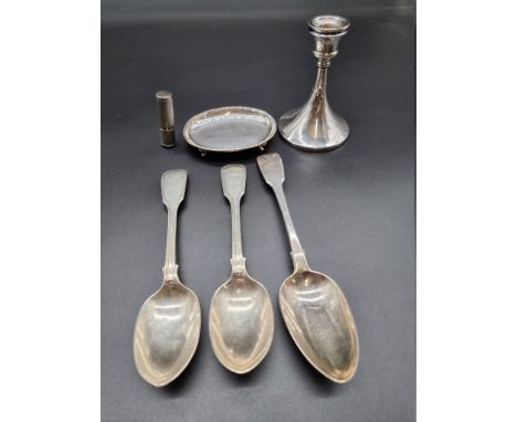 A small group of silver, comprising; an engine turned lipstick cover, stamped sterling, 5.6cm; an oval pin dish; a silver can