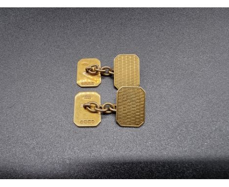 A pair of 18ct gold engine turned rectangular double sided cufflinks, having chain link connectors, 15.5 x 11mm, 9.9g. 