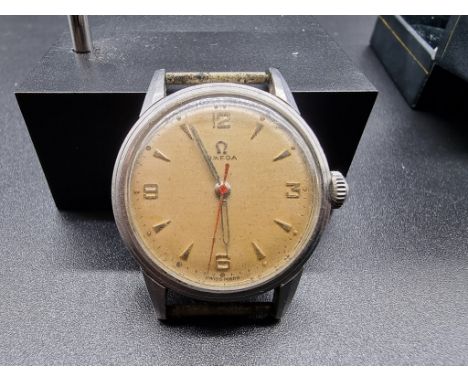 A 1940s Omega stainless steel manual wind wristwatch,&nbsp;30mm, serial number 10460950, no strap. 