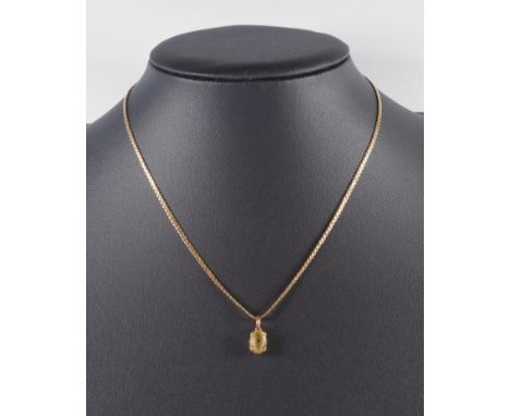 9 CT GOLD FLAT CHAIN NECKLACE, BY R J LTD, BIRMINGHAM 1997, 4.5 GRAMS, WITH A TINTED STONE PENDANT, GROSS 5.7 GRAMS (BOLTING 