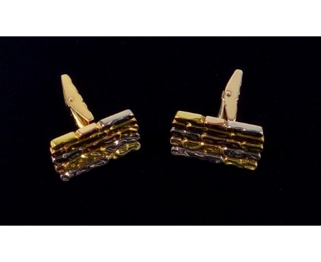 A PAIR OF LEBANESE THREE COLOUR YELLOW METAL BRICK DESIGN CUFFLINKS BY LOUIS FRENKIAN, BEIRUT, MARKED 18 K, 25.8 GRAMS 