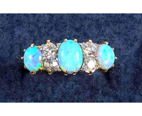 18 CT GOLD RING SET 3 CABOCHON OPALS INTERSPERSED WITH FOUR DIAMONDS, 3.5 GRAMS AND A PAIR OF 9 CT GOLD OPAL EARRINGS, 1.1 GR