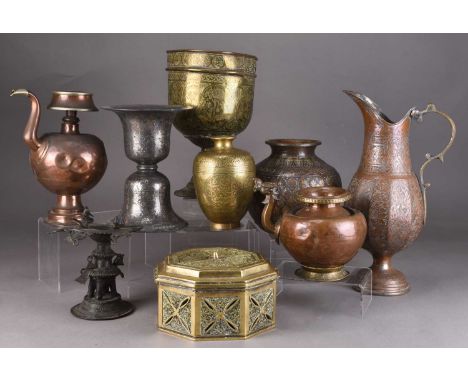 A group of Islamic metalwares including vases and ewers19th/20th centuryIncluding: An octagonal box, 17cm; a temple oil lamp,