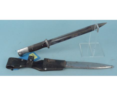 A German Third Reich era K98 knife bayonet with scabbard and leather frog, blade marked F.W.Holler with matching numbers (847