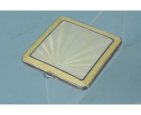 A WWII era silver powder compact with R.A.F. badge and enamelled front