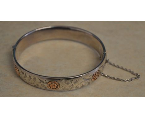 Silver bangle with safety chain, approx weight 0.8ozt