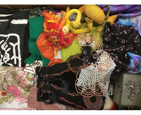 Two boxes of vintage textiles and accessories including stockings in packets, evening bags including drawstring beaded bag, A
