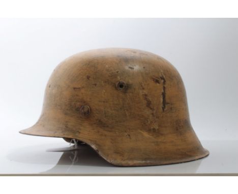 Second World War Nazi Wehrmacht M40 Pattern steel helmet, in camouflage painted finish, believed to be ex. Italian campaign