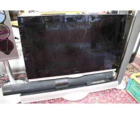 Bang & Olufsen Beovision 7 television with stand, remote control and Beolab 3500 sound barN.B. The buyer of this lot is to be
