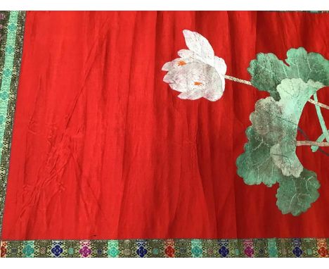 Large Chinese embroidered red silk wall hanging. Polychrome silk thread embroidered lotus flowers, water lilies and a pair of
