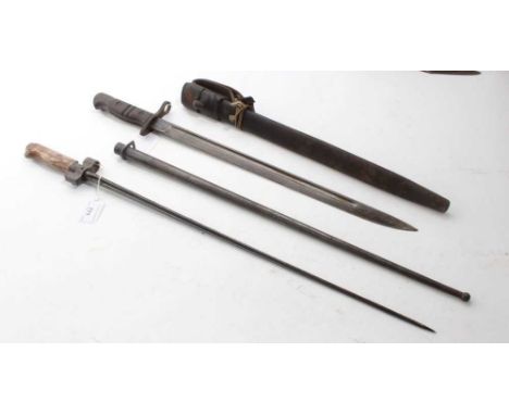French 1866 pattern Lebel Bayonet in scabbard together with a British 1907 pattern Remington bayonet in steel mounted leather