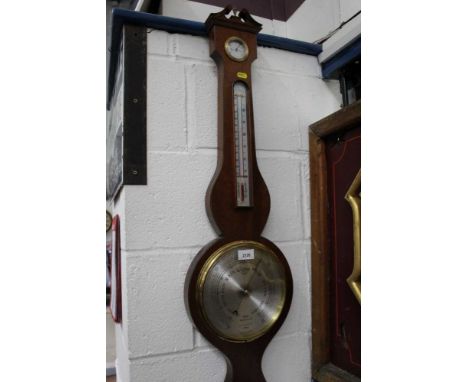 Sewills of Liverpool barometer and a wall clock