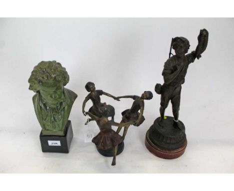 Painted pottery bust of Beethoven, a brass group of three girls dancing, and a spelter figure of a boy hunting, the largest m