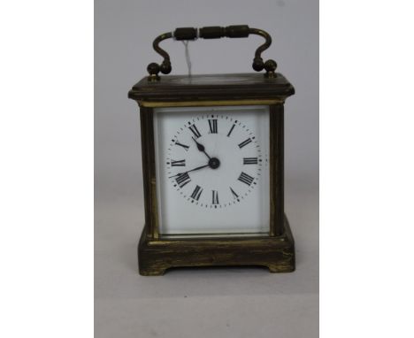 Brass carriage clock with white enamel dial, 10.5cm height