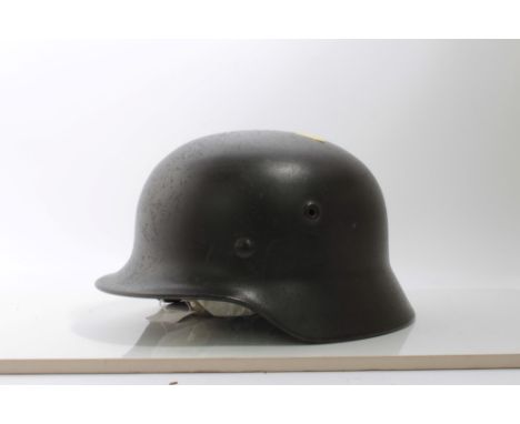 Second World War Nazi M40 pattern SS steel helmet, with single decal, tan leather lining stamped in ink '59', underside of he