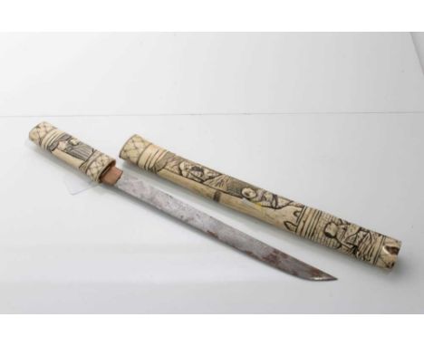 Late 19th Japanese tanto dagger in ornately carved bone scabbard with Figural decoration, blade 27cm in length