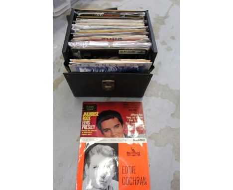 Four Vintage cases of 7" singles and EPs including Elvis Presley and Eddie Cochran