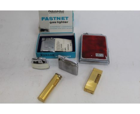 Vintage cigarette lighters to include two Dunhill