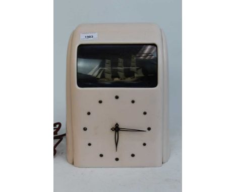 Vintage Vitascope pink Bakelite electric clock with ship automatonCondition report: Currently not working - needs re-wiring. 
