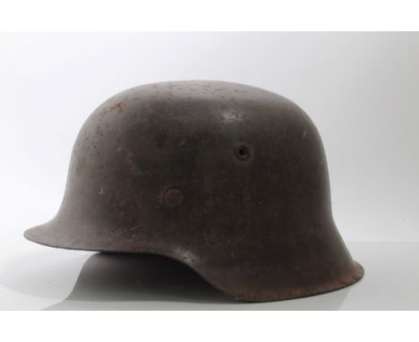 Second World War Nazi M42 Pattern helmet with steel head band and information about the original owner on paper slip