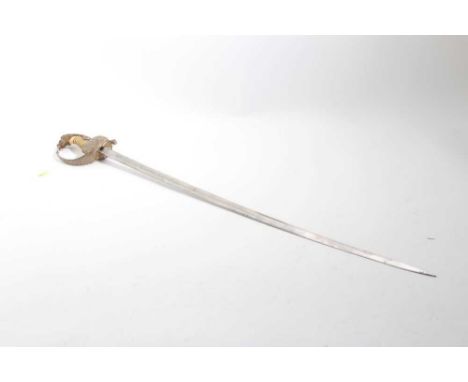 Imperial German Naval Officers' sword with gilt lions head pommel with red and green eyes, crowned fouled anchor folding guar