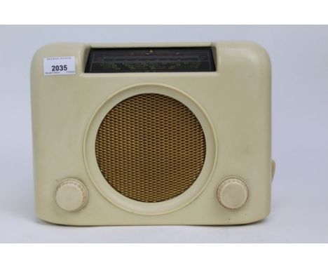 Vintage Bush radio in cream Bakelite case