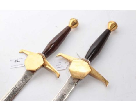 Pair Wilkinson Sword society swords with cruciform hilts and etched blades