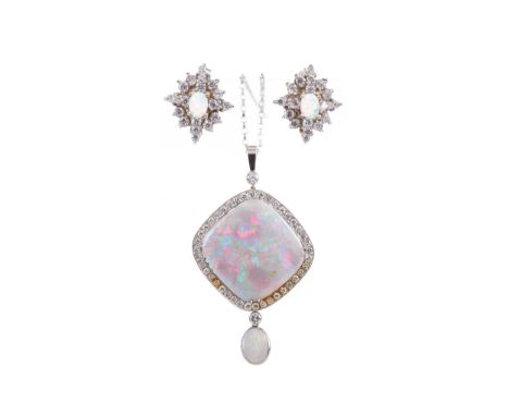 OPAL PENDANT, the opal slice bordered by white gems, on a nine carat white gold chain, along with a pair of silver opal and g