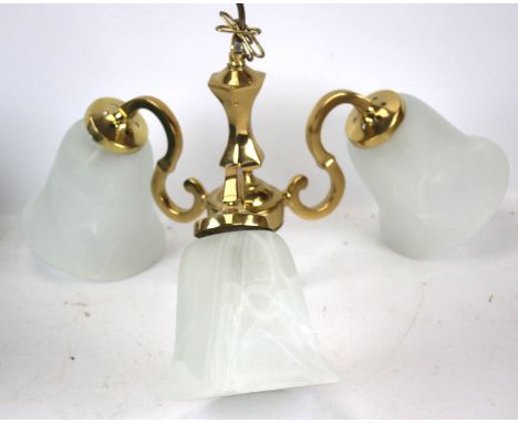 A 20th century brass ceiling light. Three branch, with glass shades, H35cm (including chain)