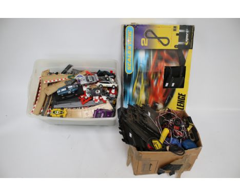 A large group of assorted vintage slot car race collectables. Including Scalextric, cars and track, etc.