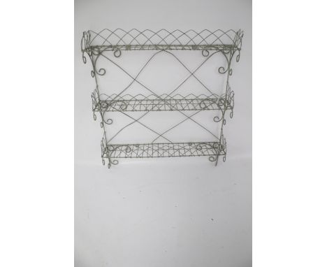 A vintage wirework frame three tier wall shelf. L61cm x D12cm x H70cm