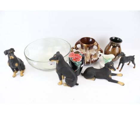 A collection of glass and ceramics. Including Poole vase and four doberman pinscher dog figures, etc. Max. H20cm