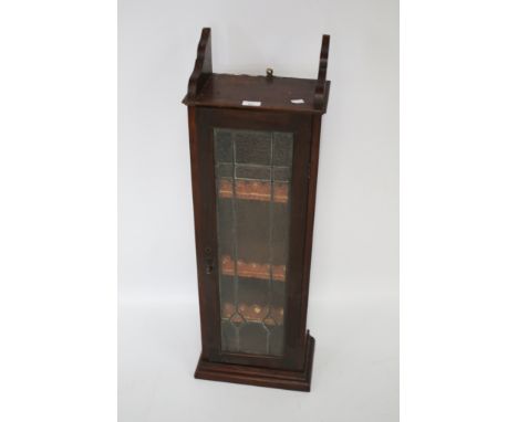 A mahogany and lead glazed wall cabinet. L31cm x D18cm x H97cm