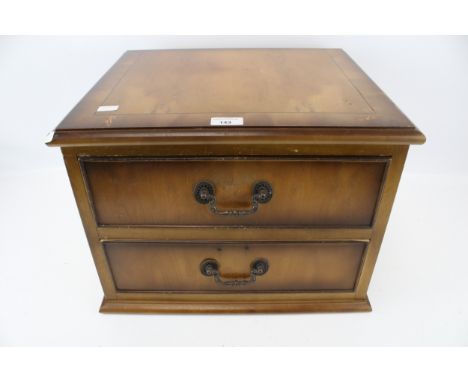 A 20th century Georgian style two drawer cabinet. L45cm x D38cm x H34cm