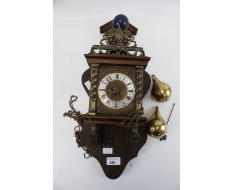 A Dutch style wall clock with pendulum and brass weights, H49cm