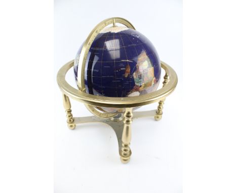 A Lapis Globe mounted with mineral and semi-precious stones. With paperwork referencing the 30 different minerals and semi-pr