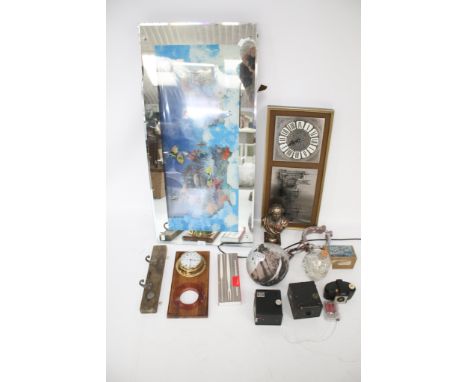 A collection of decorative items. To include a glass skull with an internal LED brain; a joke plastic ball and chain; a wood 