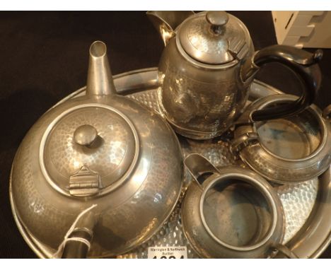 Arts and Crafts style hand planished pewter tea service with tray marked Lion Pewter 