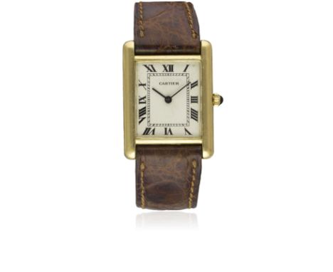 A GENTLEMAN'S 18K SOLID GOLD CARTIER TANK WRIST WATCHCIRCA 1970sMovement: Manual wind, signed Cartier.Case: Approx. 31mm by 2