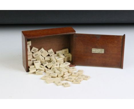 Mid 19th century Bone Spelling Alphabet Letters, approximately 95 in total, each tile approximately 2cm high, contained in a 