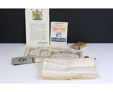 A full size British World War Two medal group in original issue box together with a first aid medal and a quantity of associa