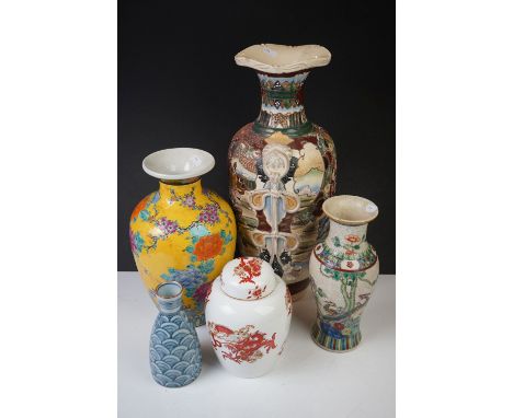 Four Oriental ceramic vases to include a large baluster-form example with enamelled figural decoration and applied tassels (4