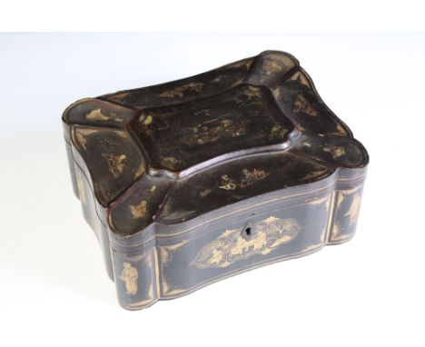 19th century Chinese Black Lacquered Tea Caddy with gilt chinoiserie decoration, the hinged lid opening to two pewter lidded 