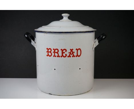 Large Early to Mid century Enamel Bread Bin and Lid, marked in red writing ' Bread ', with ventilation holes, 38cm high 