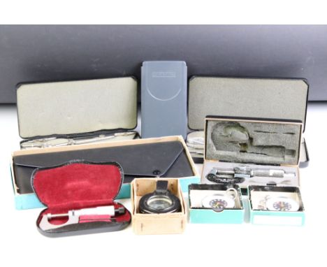 A small group of mixed collectables to include a World War Two military compass, drawing equipment, stopwatches....etc. 