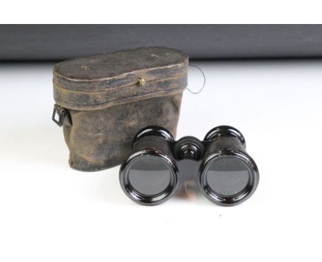 A pair of vintage opera glasses in original fitted case. 