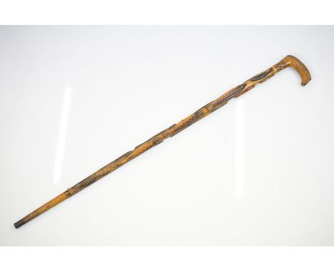 Late 19th Century Swedish carved wooden fish walking stick, coloured in polychrome, with metal ferrule, measures approx 89cm 